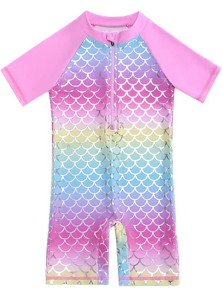 Kids' rainbow mermaid-scale rash guard swimwear with pink sleeves, front zipper, and UV-protective fabric for sun safety.
