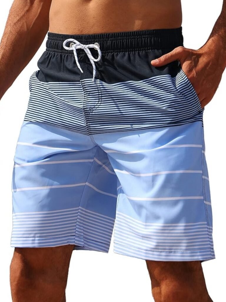 Men’s striped swim trunks: navy waistband, black/white stripes top, light blue/white stripes bottom, white drawstring, quick-dry fabric, model wearing for swimwear product display.