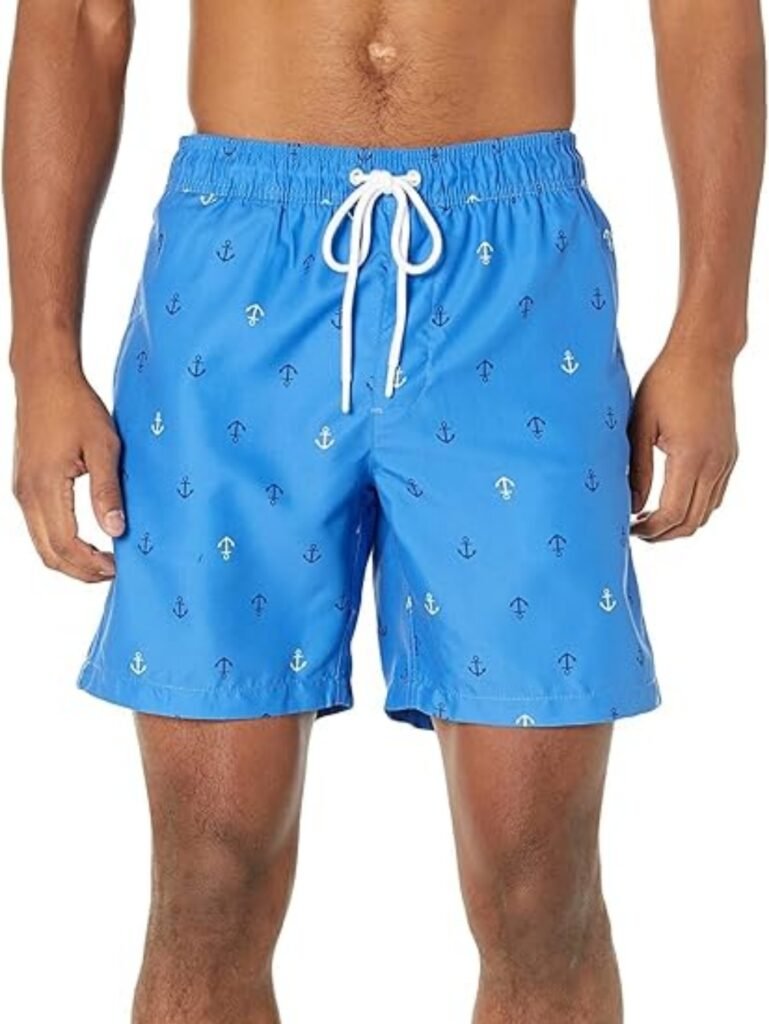 Blue men's anchor-print swim trunks with white drawstring, elastic waistband, and lightweight fabric for beachwear.