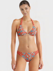 Red halter bikini top and matching bottoms with blue paisley pattern, high-cut waistband, stretch fabric for swimwear manufacturer collection.