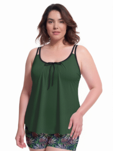Green ribbed tank-style plus-size swim top with black trim and front tie, paired with floral print shorts for swimwear collection.