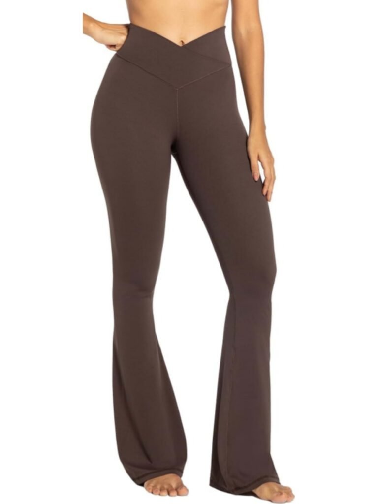 Brown high-waisted flared yoga pants with V-front waistband, stretchy fabric, model standing barefoot.