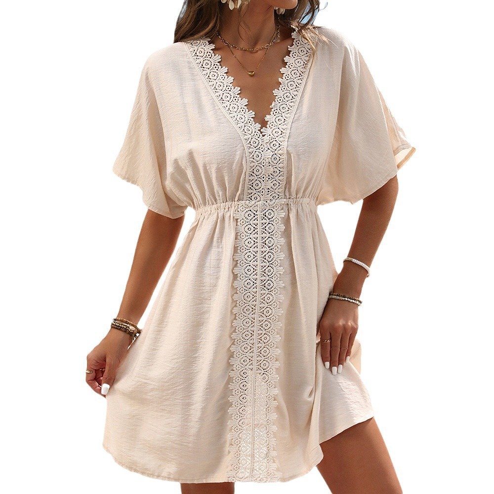 Beige short sleeve kaftan cover-up with deep V-neck and lace insert panel.
