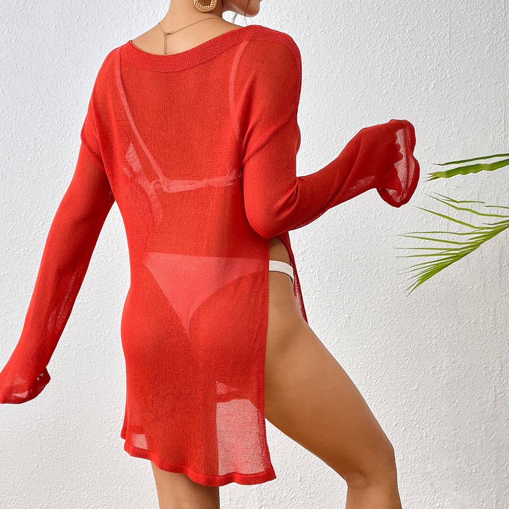 Red sheer long-sleeve knit cover-up with boat neck, side slits, and flared bell sleeves.