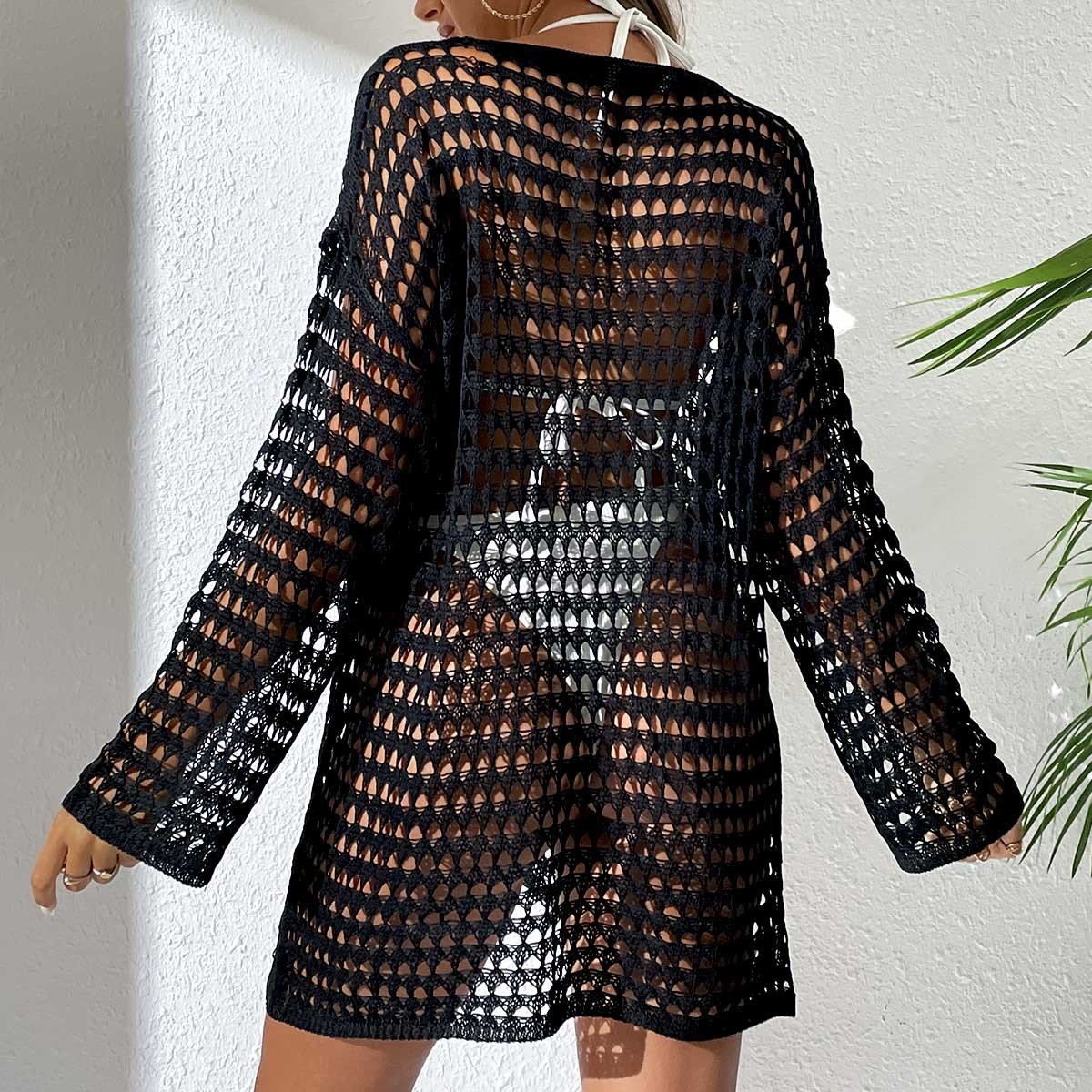 Black open-knit long sleeve cover-up dress with a boat neckline and relaxed mini silhouette.