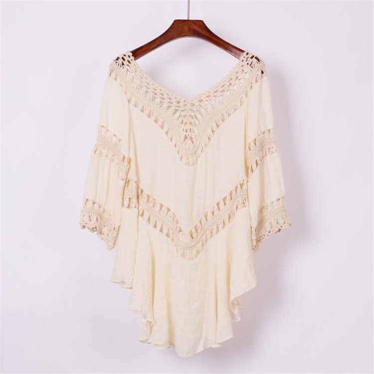 Cream women's V-neck crochet insert cover-up tunic with three-quarter sleeves and high-low hem.