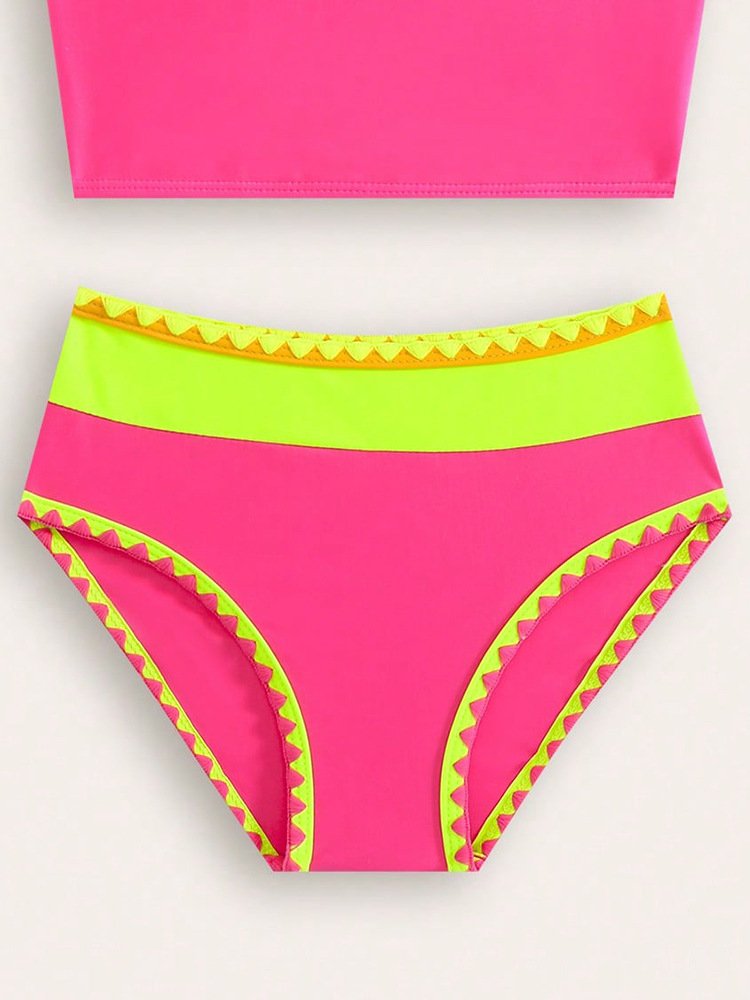 Pink and neon green high-waist bikini bottoms with scalloped trim and color-block waistband.