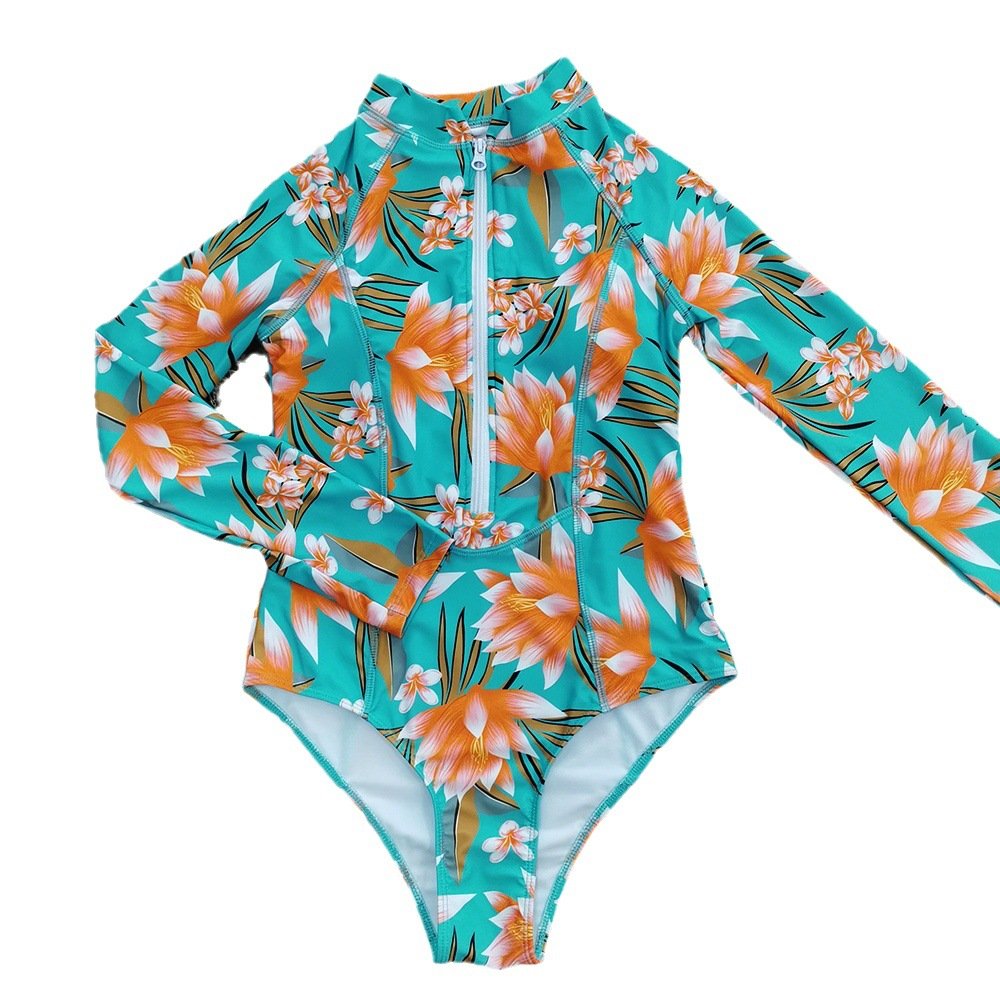 Teal floral print long-sleeve zip-front rash guard one-piece swimsuit with stand collar and high-cut legs.