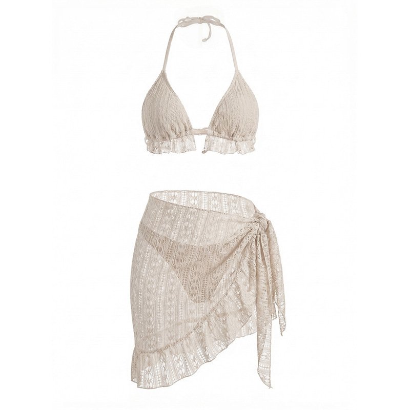 Beige textured two-piece swim set featuring a ruffled halter triangle bikini top and a matching side-tie wrap skirt.