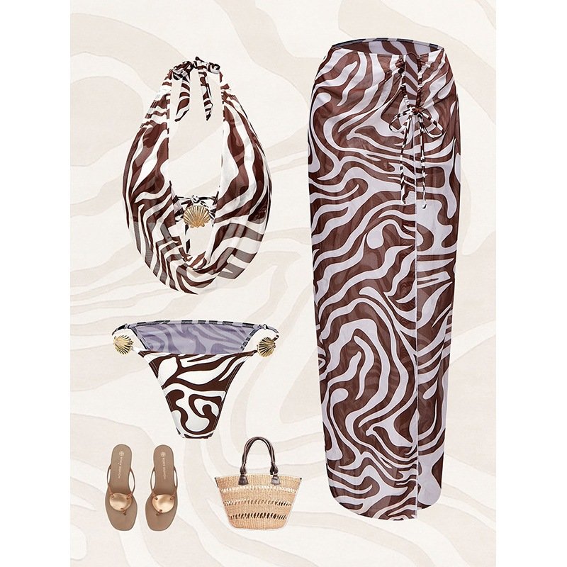 Brown and white zebra print three-piece swimwear set featuring a draped halter bikini top, side-tie bottoms, and a