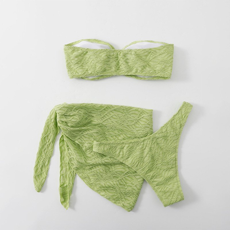 Light green textured three-piece swimwear set featuring a strapless bandeau top with a center ring detail and a