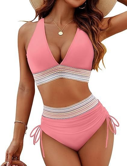 Pink halter crop top bikini featuring a deep V-neck and multi-colored striped band, paired with matching ruched tie-side