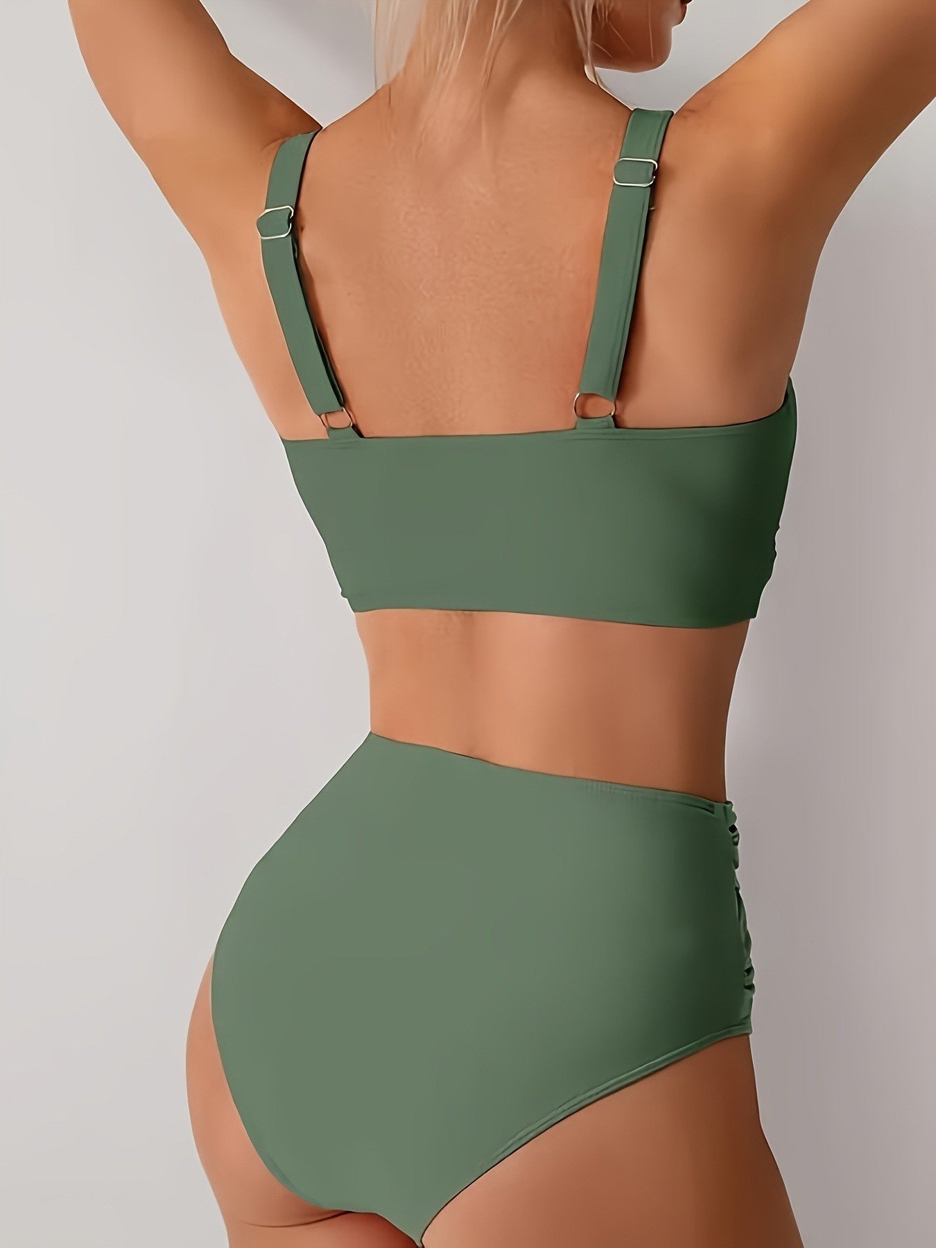 Back view of a sage green two-piece bikini set featuring a crop top with adjustable straps and high-waisted