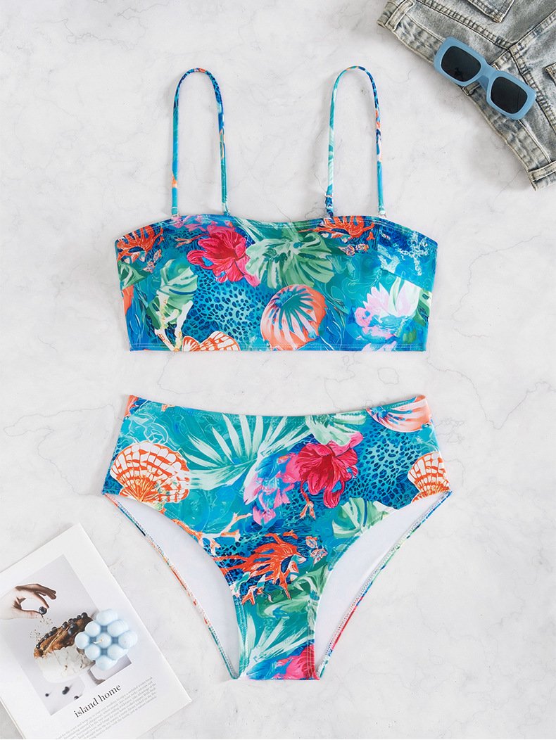A two-piece floral print bikini set featuring a bandeau top with thin straps and matching high-waisted bottoms.