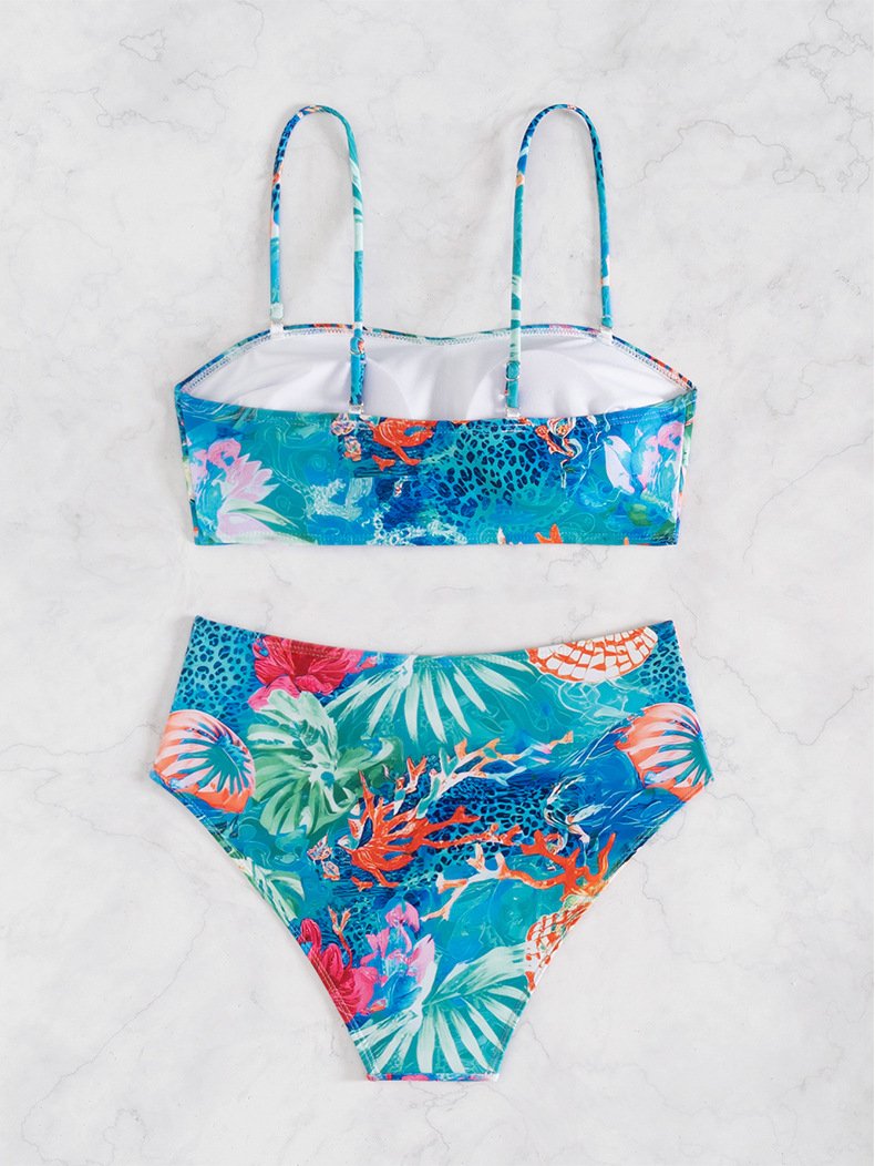 A tropical print two-piece bikini set featuring a bandeau top with adjustable straps and high-waisted bottoms.