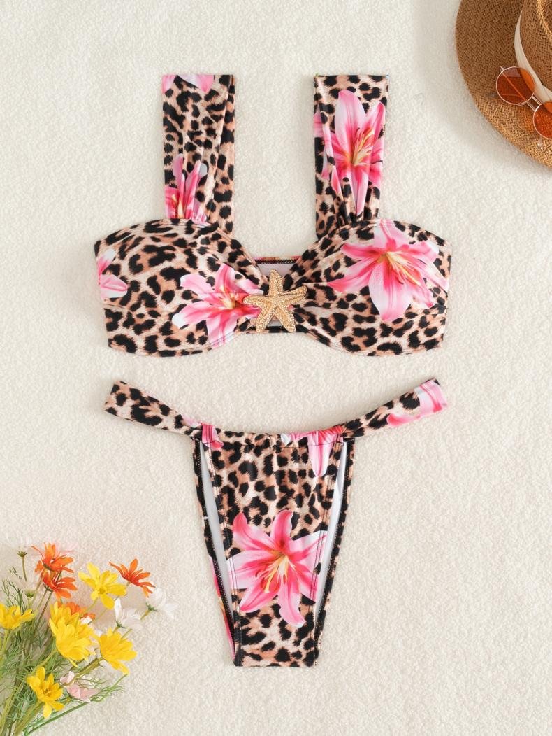 Leopard print bikini set with pink floral accents, featuring a twist-front bandeau top with a starfish detail and