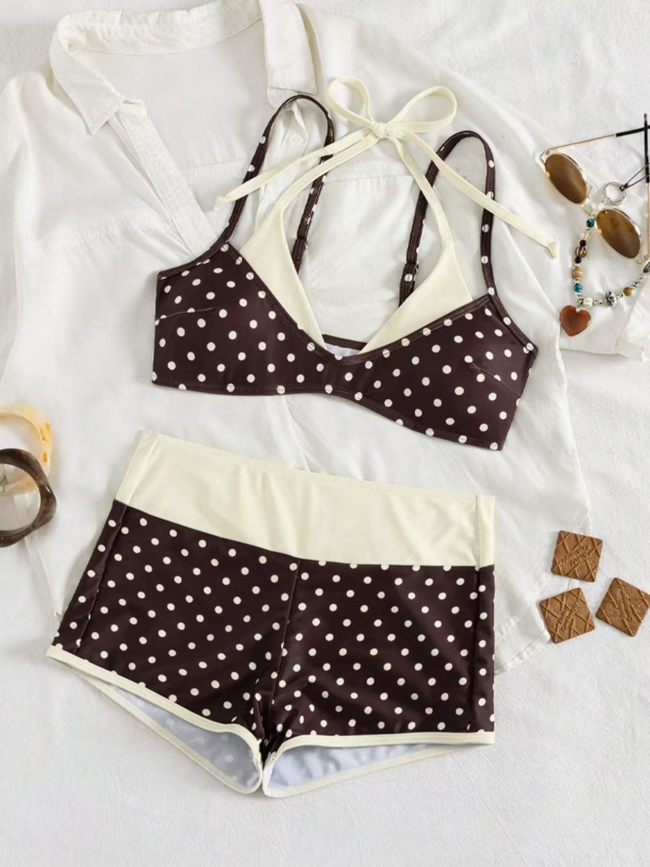 Brown and cream polka dot halter triangle bikini set with matching high-waisted boyshort bottoms.