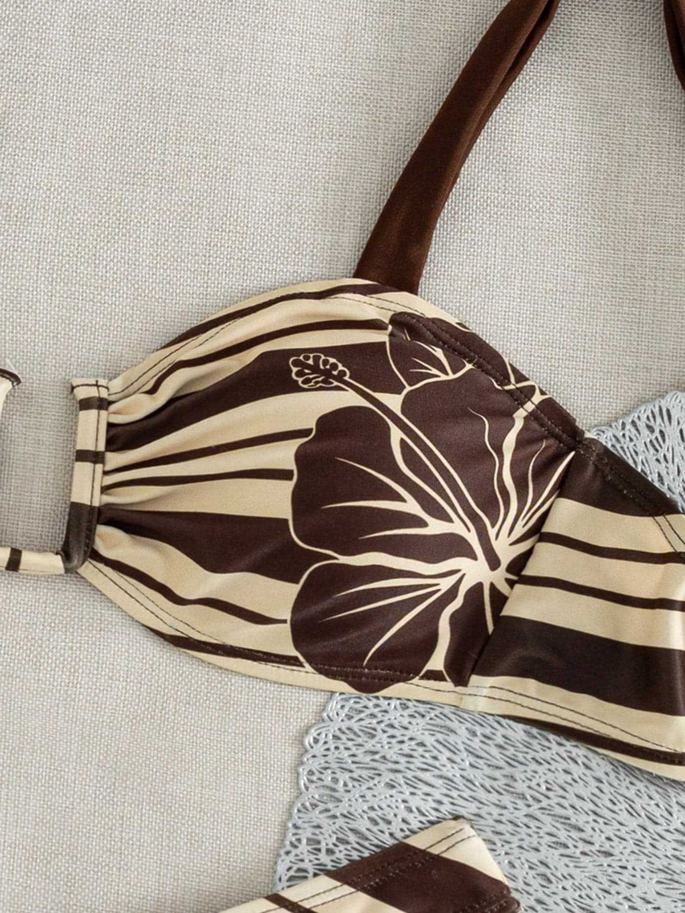 Brown and beige floral striped underwire halter bikini top with adjustable straps.