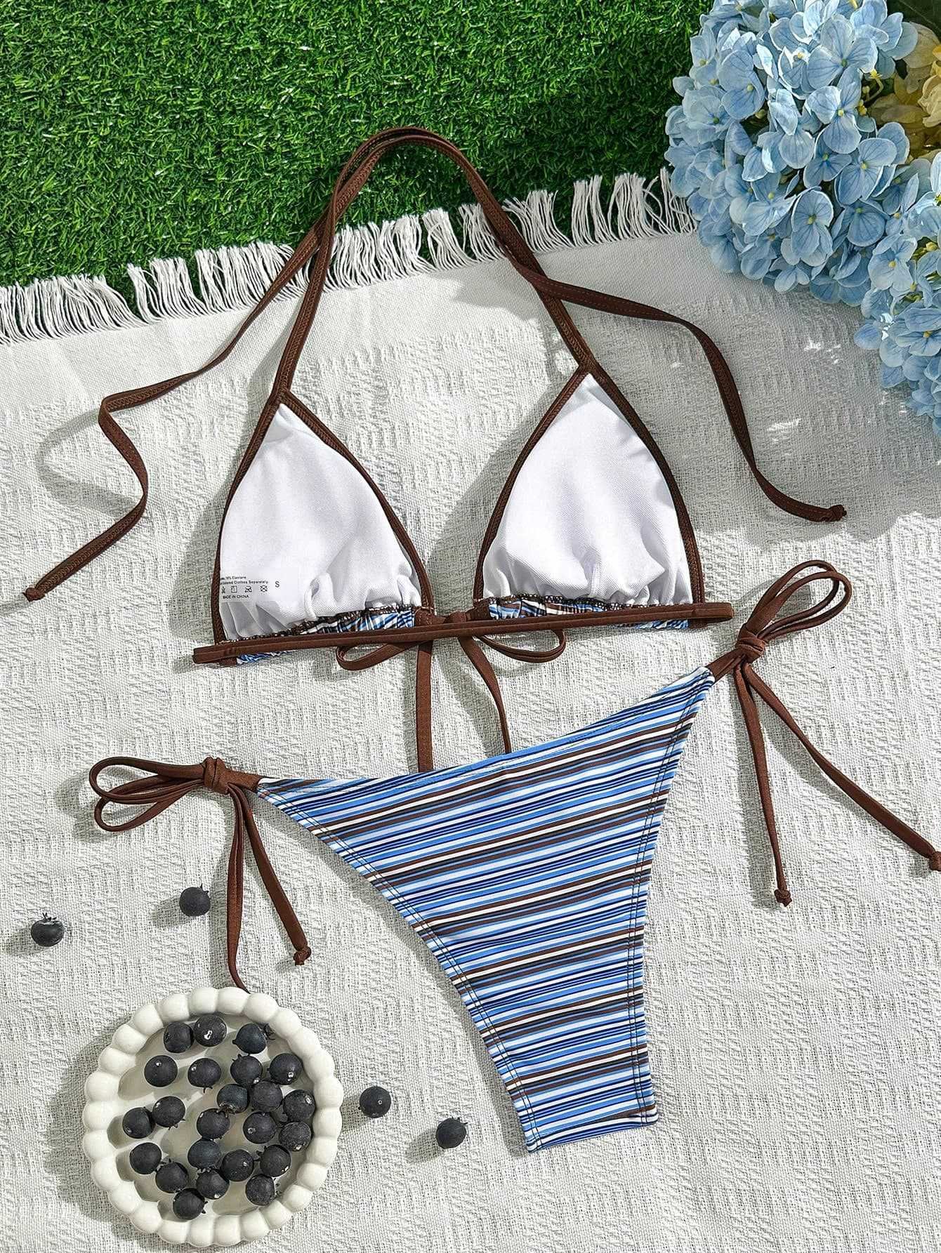 White and blue striped tie-front triangle bikini set with brown straps.