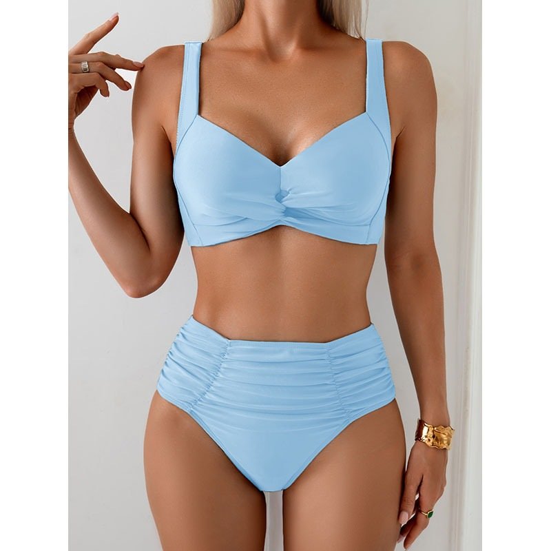 Light blue two-piece bikini featuring a knotted underwire top and high-waist ruched bottoms.
