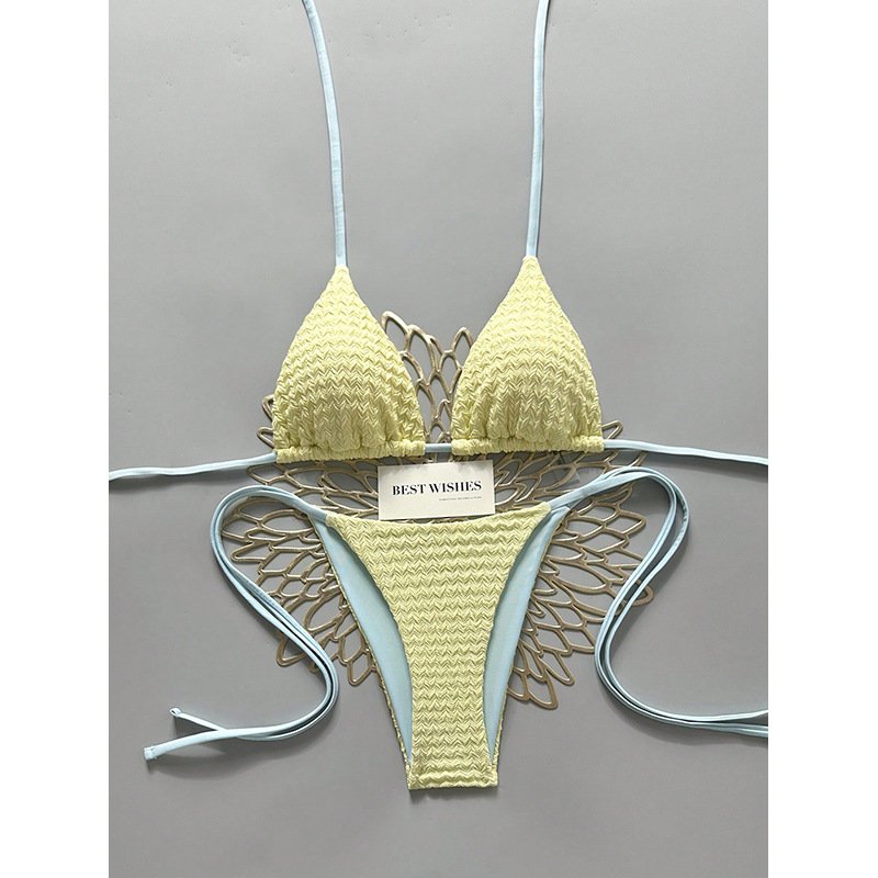 Yellow textured reversible string triangle bikini set with light blue side ties.