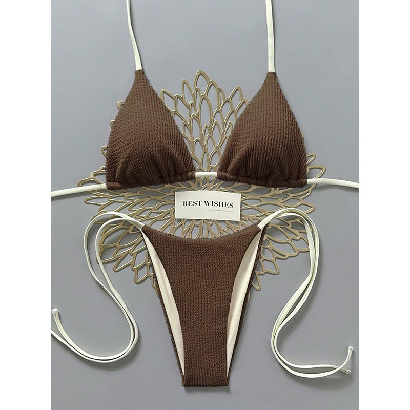 Brown and white reversible string triangle bikini set with adjustable halter straps and side ties.