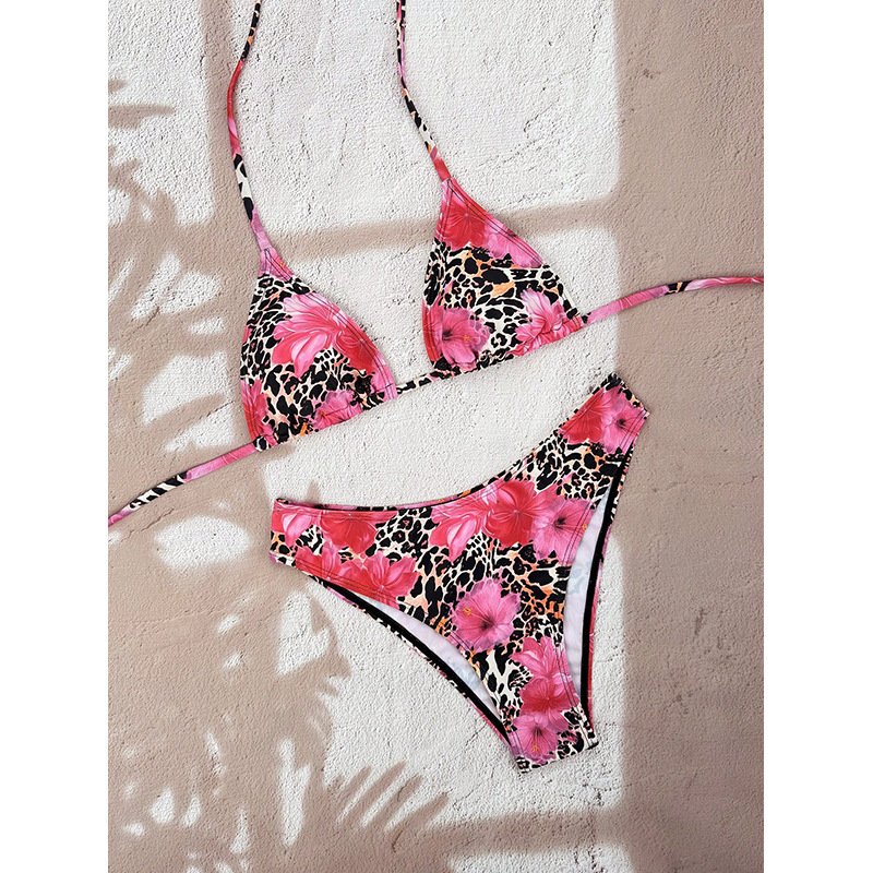 A pink leopard and floral print halter triangle bikini set with tie closures.