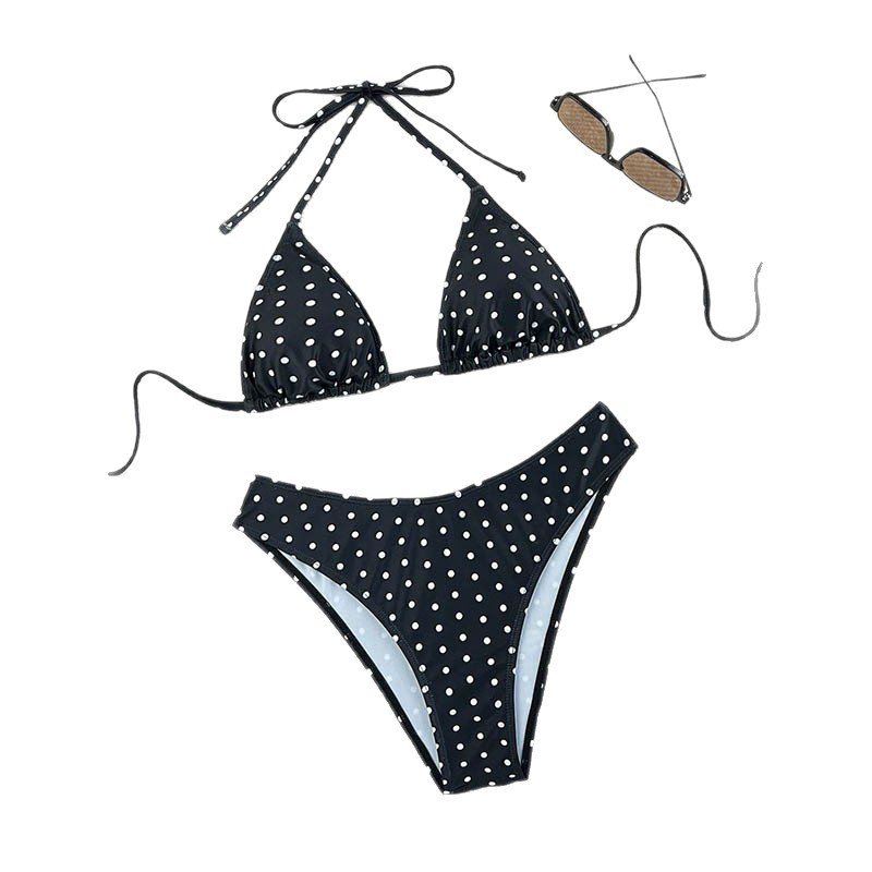 Black and white polka dot halter triangle bikini set with tie closures.