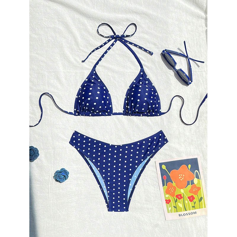 Blue and white polka dot halter triangle bikini set with tie neck and back closures.