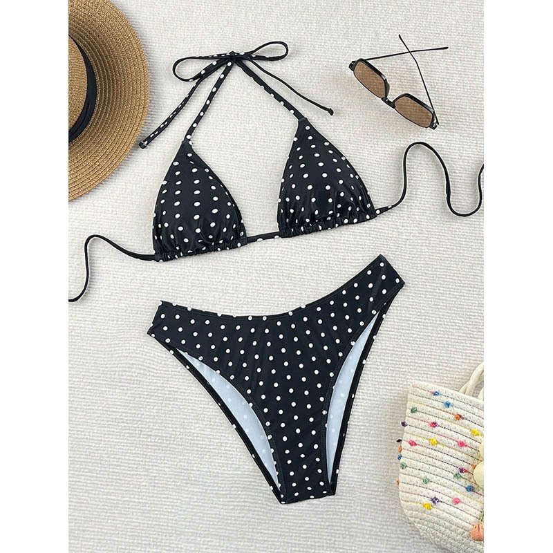 Black and white polka dot halter triangle bikini set with tie closures.