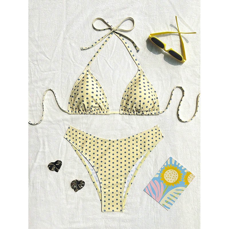 Cream polka dot halter triangle bikini set with tie neck and adjustable side bottoms.