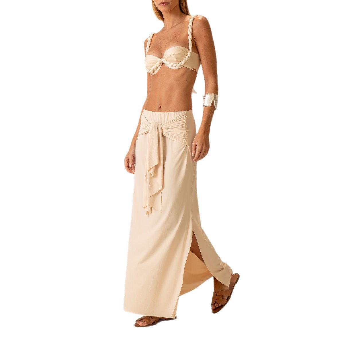 Beige underwire bikini top with rope trim straps and matching high-waisted wrap skirt.