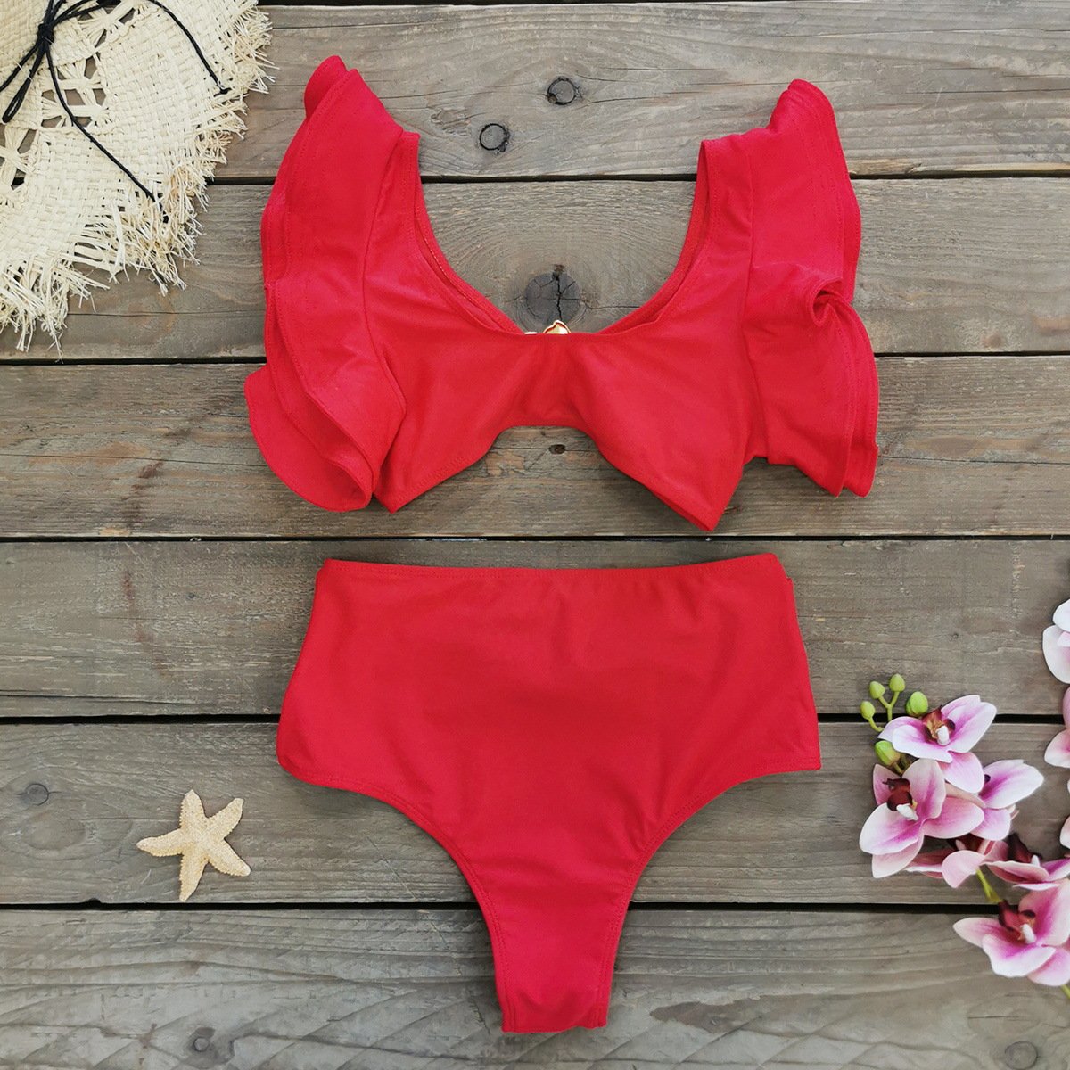 Red two-piece bikini set with ruffled sleeves, plunging neckline, and high-waisted bottoms.