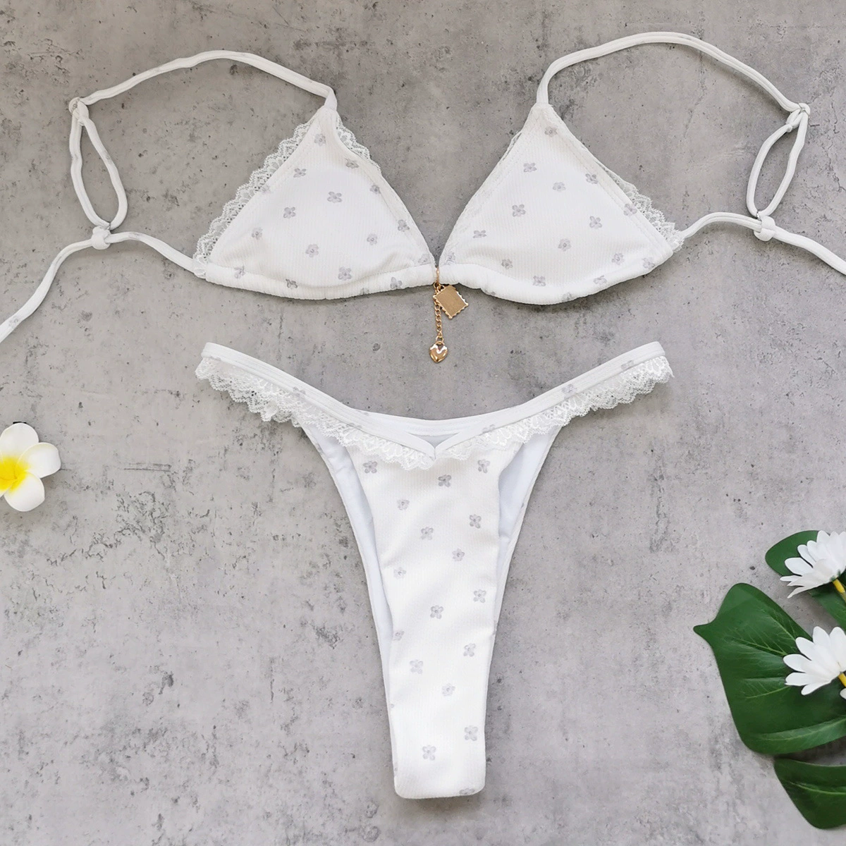 Two-Piece Triangle Bikini Set with Lace Trim and Charm Detail