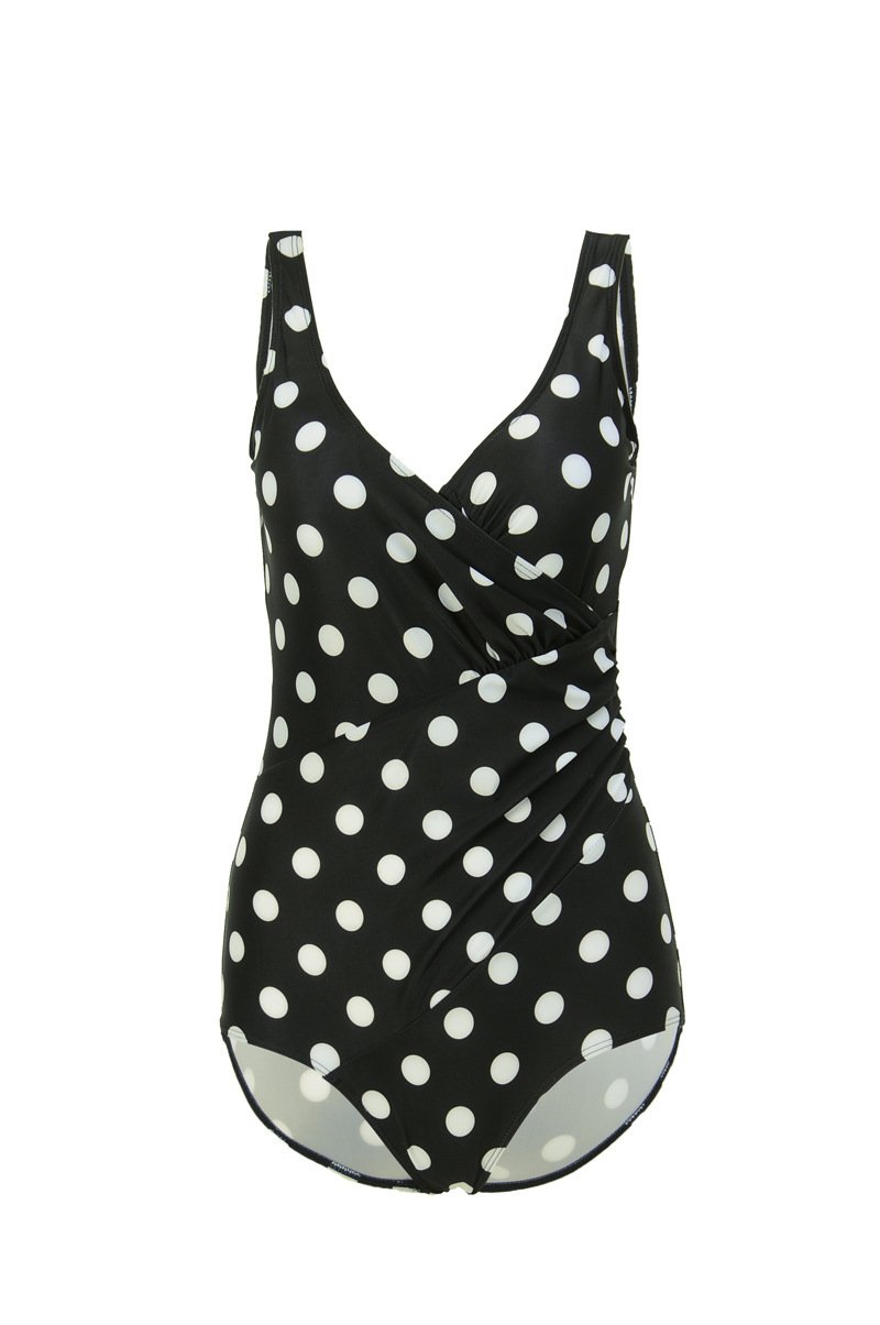 Black one-piece swimsuit with white polka dots, featuring a deep V-neck wrap-front bodice and wide shoulder straps.