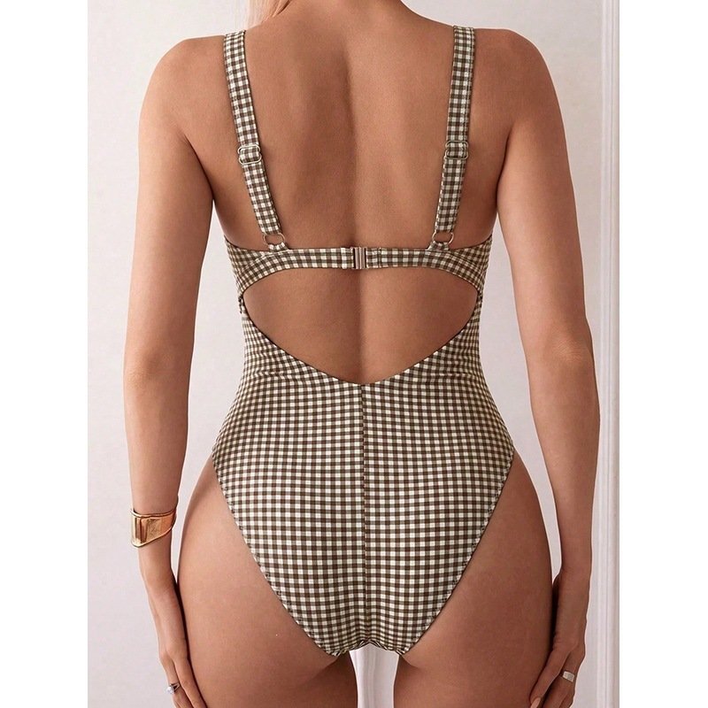 Back view of a brown and white gingham check one-piece swimsuit with adjustable straps and an open back