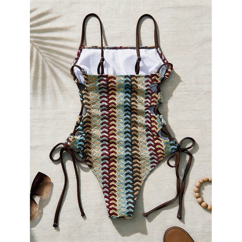 Multicolor crochet one-piece swimsuit with brown spaghetti straps and side tie closures.