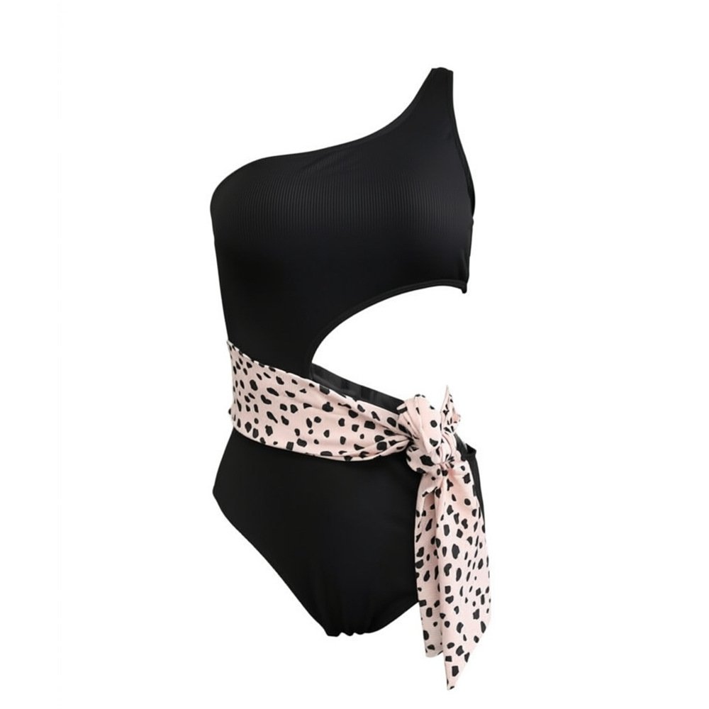 Black one-shoulder one-piece swimsuit featuring a side waist cutout and a contrasting leopard print tie belt.