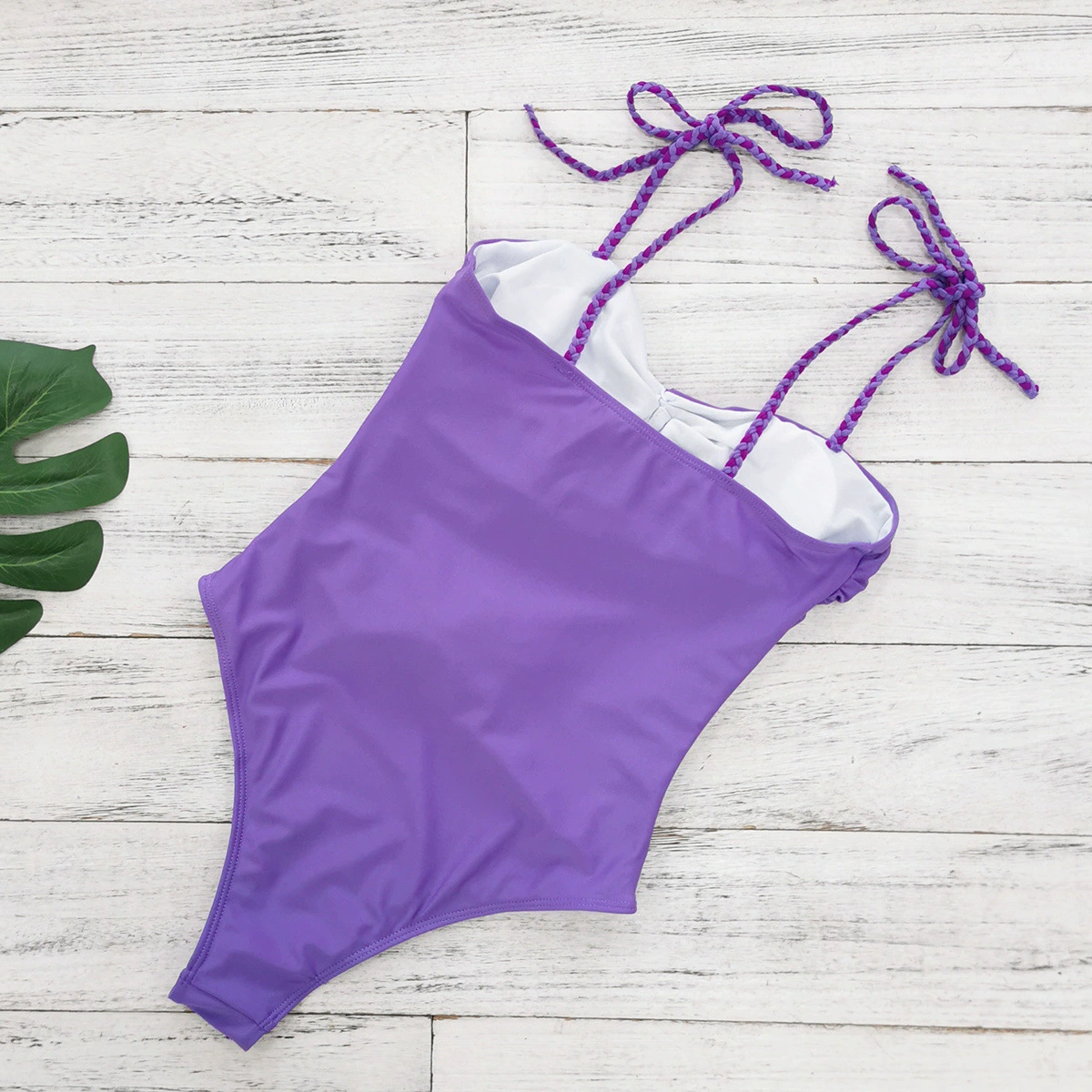 Women's Cutout One-Piece Swimsuit with Halter Ties and Decorative Accents view 4