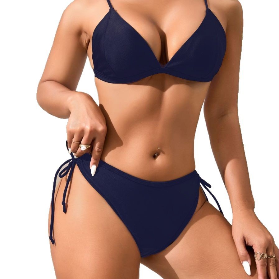 Navy blue women's triangle bikini set with adjustable straps and tie-side bottoms.