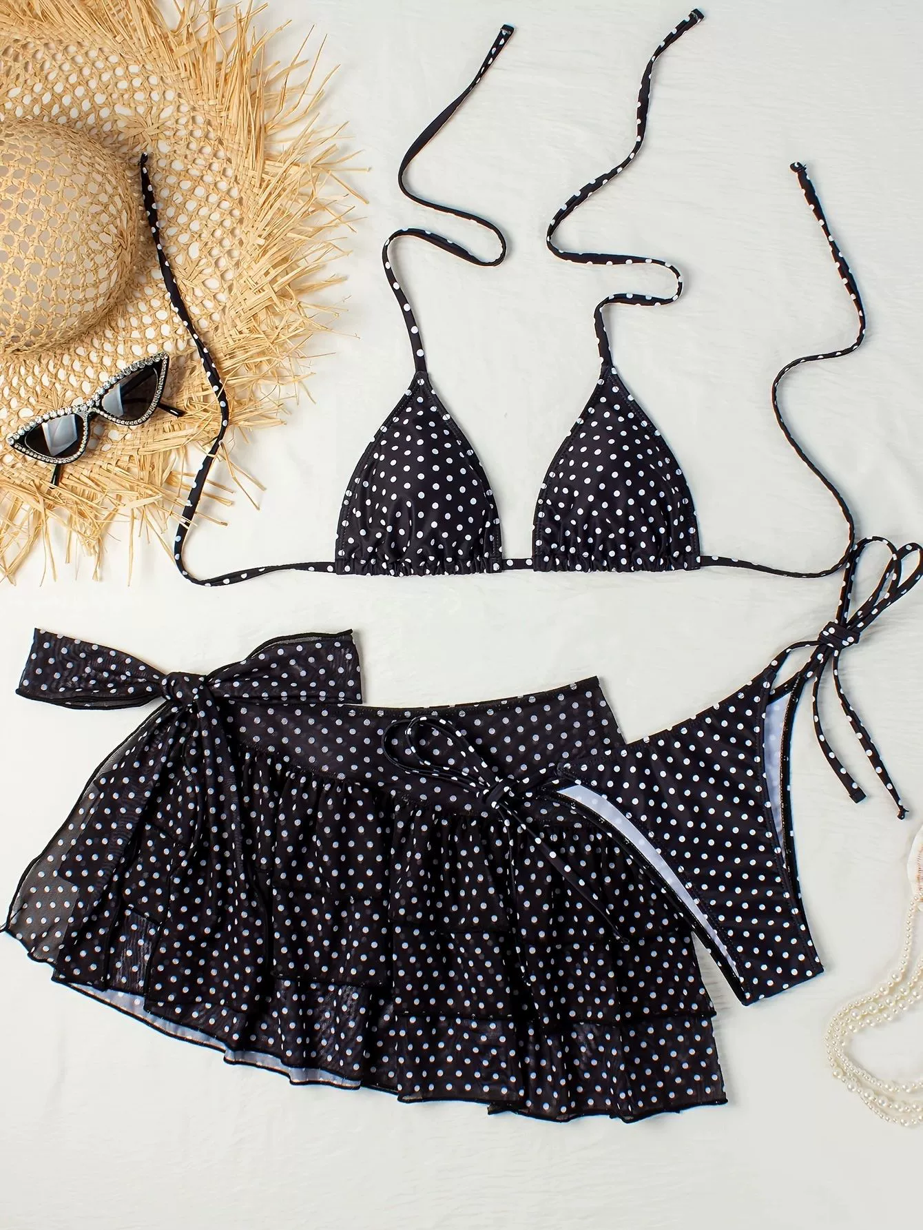Three-Piece Triangle Halter Bikini Set with High-Waisted Bottom and Ruffled Skirt Cover-Up in Black Polka Dot
