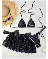 Three-Piece Triangle Halter Bikini Set with High-Waisted Bottom and Ruffled Skirt Cover-Up view 6
