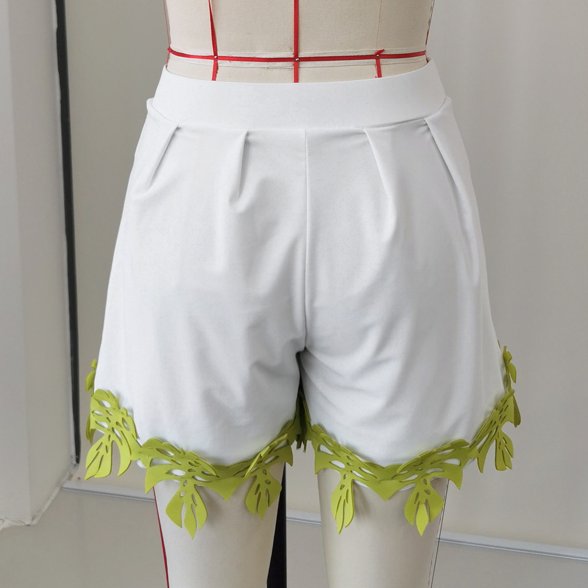 High Waist Pleated Bow Tie Shorts with Cut-Out Hem