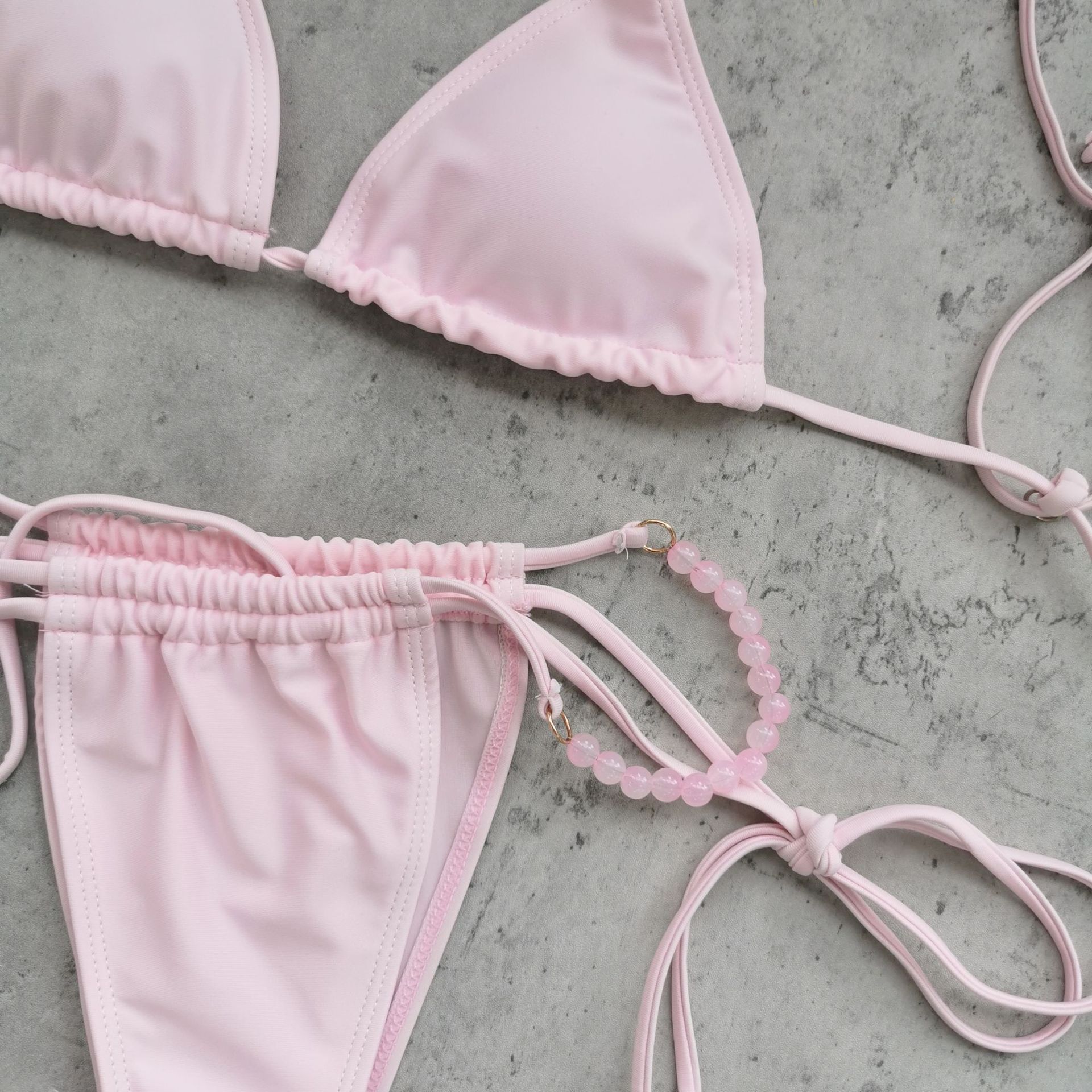 Light Pink Triangle Bikini Set with Beaded Halter Straps and Side Tie Bottoms
