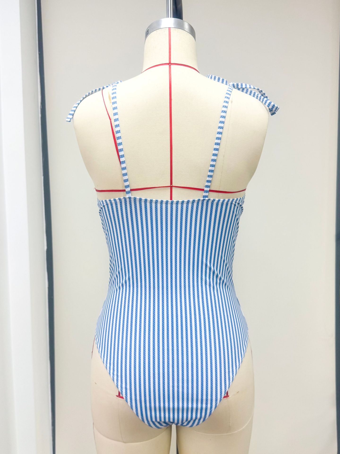 Blue and White Striped One-Piece Swimsuit with Tie Straps and Front Cutout Bows