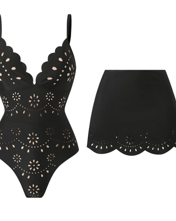 Traje de baño negro de una pieza con falda a juego y corte láser festoneado