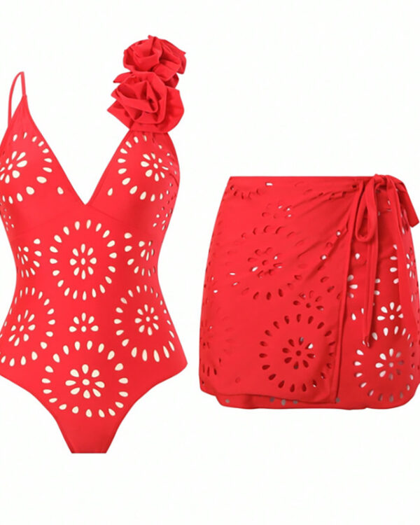 Traje de baño de una pieza rojo anaranjado con ojetes, flor y falda envolvente