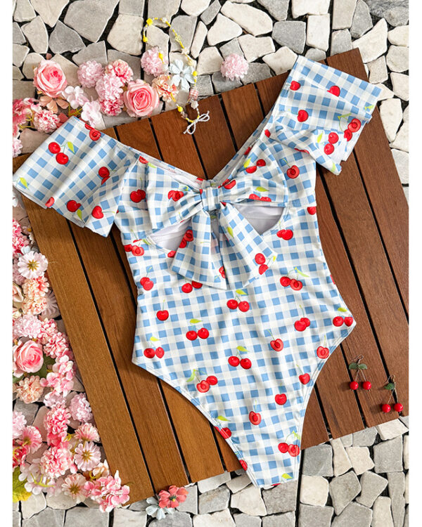 Traje de baño entero con escote en V, mangas volantes y estampado de cerezas